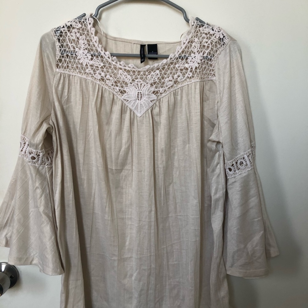Cream long sleeve top with lace pattern decoration